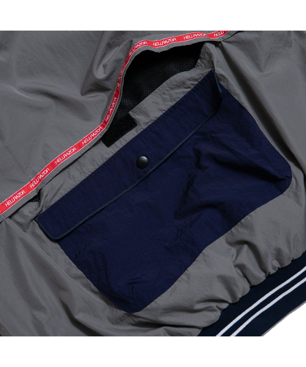 コラボ】FILA×HELLRAZOR TRADEMARK LOGO PULLOVER NYLON JACKET|FILA